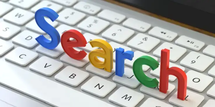 Een toetsenbord met in gekleurde letters het woord 'Search', symbool voor onze tips voor Google Ads
