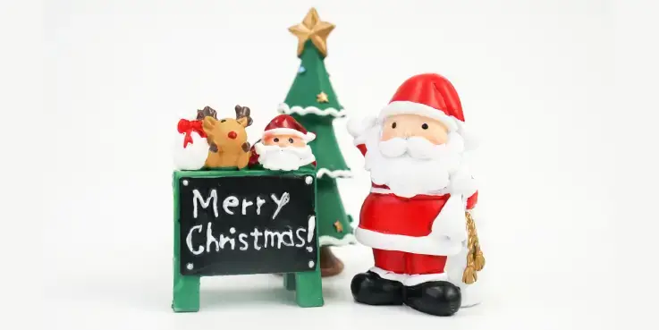 Afbeelding van een kerstman met 'merry christmas' vanwege tips voor webshops voor kerst