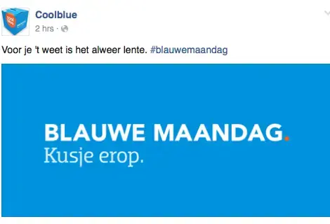 De actie van Coolblue Blue Monday met de tekst 'Voor je 't weet is het alweer lente. #blauwemaandag Blauwe maandag. Kusje erop.'