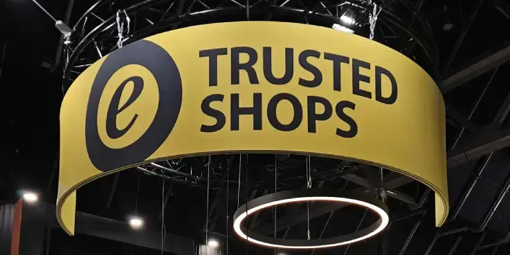 Afbeelding van het Trusted Shops-logo op een beurs