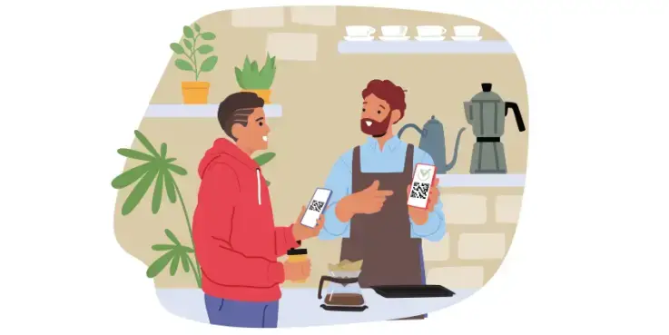 Een persoon in een rode hoodie betaalt met Wero, met een QR-code, in een café