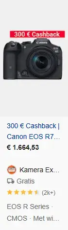Google Shopping‑productkaart van de Canon EOS R7 camera bij Kamera Express, met afbeelding van de systeemcamera, label '300 € Cashback', prijs €1.664,53, gratis verzending en klantbeoordeling, zichtbaar binnen Google Shopping-resultaten.